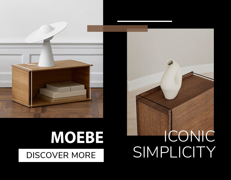 Minimalist wooden storage unit with white sculptural decor pieces, promoting Moebe’s simple and iconic Scandinavian design.